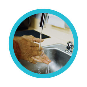 washing hands before touching an eye drop bottle