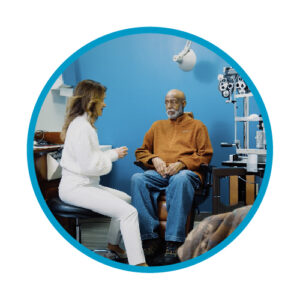 an eye doctor talking to her patient